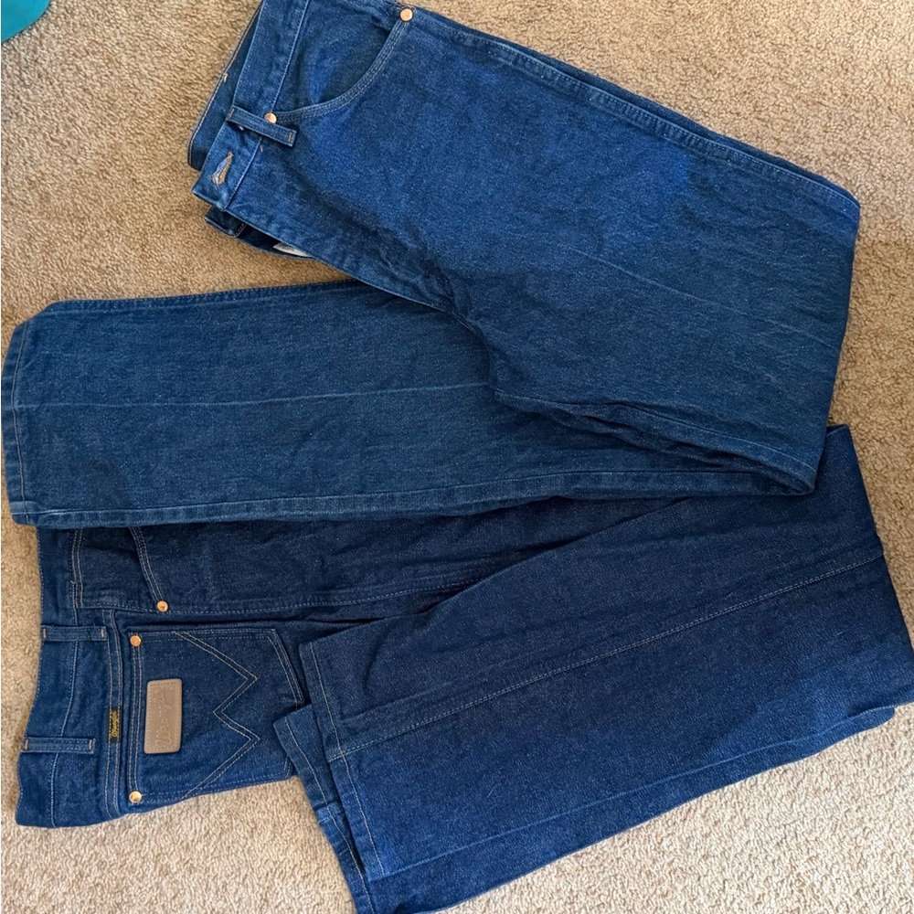 Wrangler Men's Deep Blue Slim Straight Jeans, 2 pairs for $50.